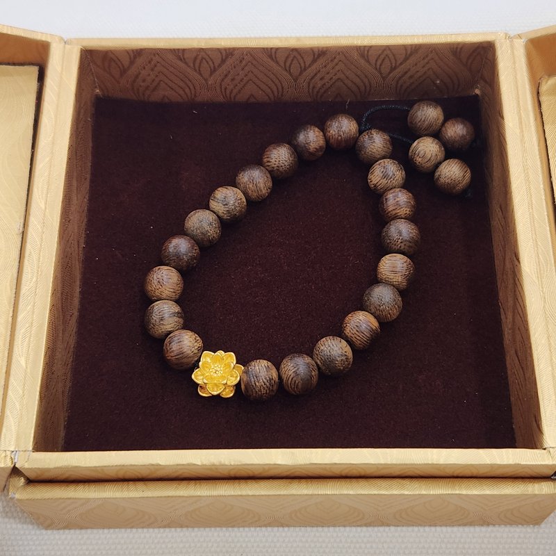 21-Bead Agarwood Bracelet for Women - paired with a 24K gold lotus charm, carrying a wish of peace for a loved one